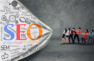 Team pulling marketing banner that says seo sem ppc social media etc.