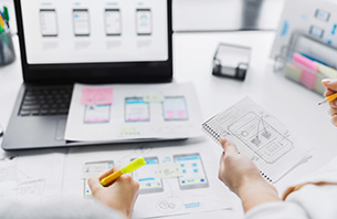 Web designers working on user interface mobile website design for ux and usability