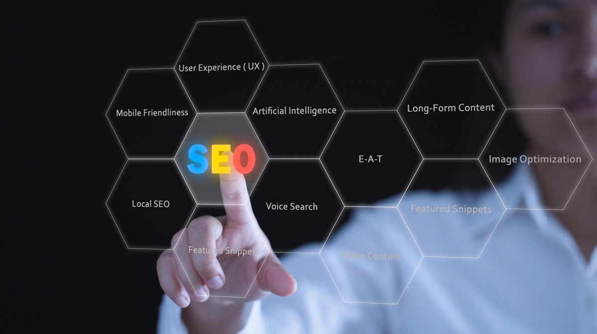 Woman pointing to SEO components which include user experience (UX) design Woman pointing to SEO components which include user experience (UX) design